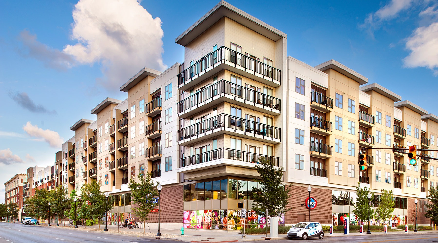 Welcome Home view of building on a street corner